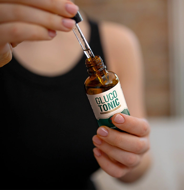 GlucoTonic girl taking drops